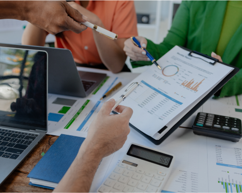 Developer reviewing client payment statements and financial charts